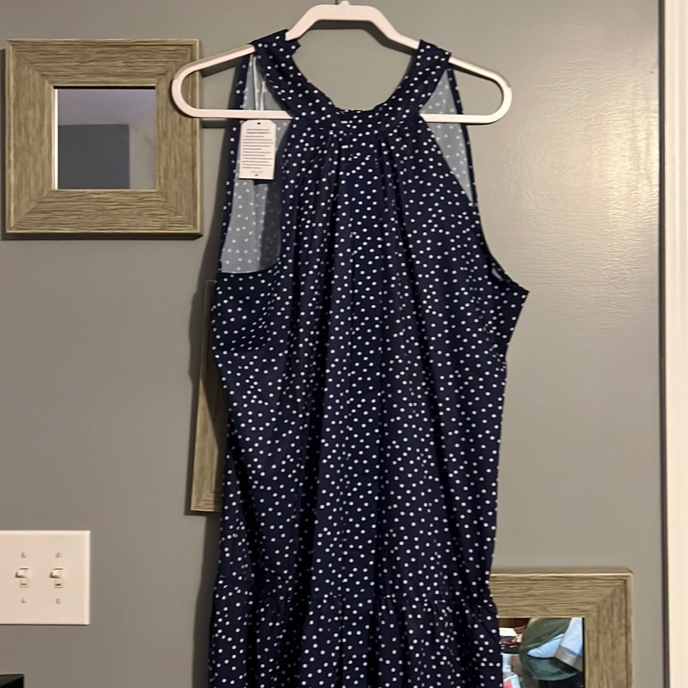 Navy blue belted polka dot ankle length dress.